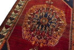 Backside of handmade 2000s Shiraz rug showing knot structure and weave density