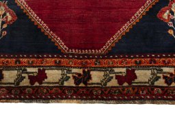 Close-up detail of 2000s Shiraz rug from Iran / Persia showing Wool weave