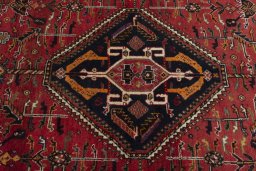 Central medallion detail of 2000s Shiraz rug from Iran / Persia