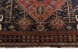 Close-up detail of 2000s Shiraz rug from Iran / Persia showing Wool weave