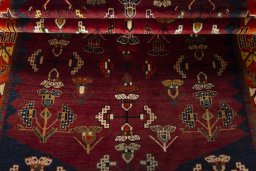 Full view of 2000s Shiraz rug from Iran / Persia, 214 × 128 cm in Red tones