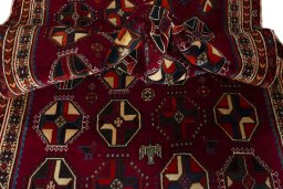 Corner detail of 2000s Shiraz rug showing border pattern and Wool pile