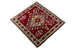 Corner detail of 2000s Shiraz rug showing border pattern and Wool pile
