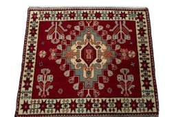 Surface texture of 2000s Shiraz rug with natural Wool and intricate pattern