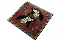 Corner detail of 2000s Shiraz rug showing border pattern and Wool pile