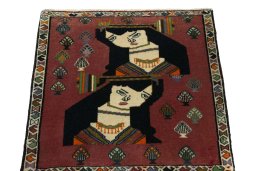 Surface texture of 2000s Shiraz rug with natural Wool and intricate pattern