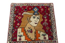 Surface texture of 2000s Shiraz rug with natural Wool and intricate pattern