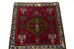 Surface texture of 2000s Shiraz rug with natural Wool and intricate pattern
