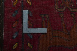 Backside of handmade 2000s Shiraz rug showing knot structure and weave density