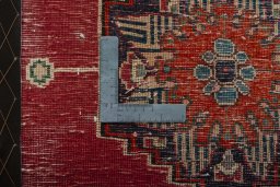 Backside of handmade 2000s Shiraz rug showing knot structure and weave density