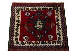 Surface texture of 2000s Shiraz rug with natural Wool and intricate pattern