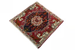 Corner detail of 2000s Shiraz rug showing border pattern and Wool pile