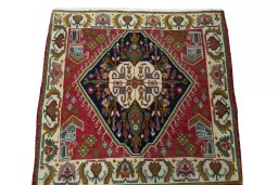 Surface texture of 2000s Shiraz rug with natural Wool and intricate pattern