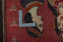 Backside of handmade 2000s Shiraz rug showing knot structure and weave density