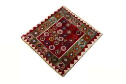 Corner detail of 2000s Shiraz rug showing border pattern and Wool pile