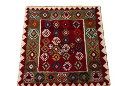 Surface texture of 2000s Shiraz rug with natural Wool and intricate pattern