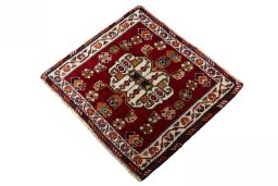 Corner detail of 2000s Shiraz rug showing border pattern and Wool pile