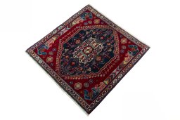 Corner detail of 2000s Shiraz rug showing border pattern and Wool pile