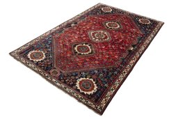 Corner detail of 1970s Shiraz rug showing border pattern and Wool pile