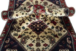 Corner detail of New Shiraz rug showing border pattern and Wool pile
