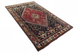 Close-up detail of 2000s Shiraz rug from Iran / Persia showing Wool weave