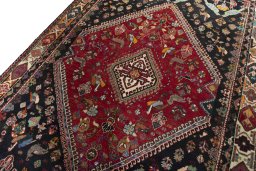 Backside of handmade 2000s Shiraz rug showing knot structure and weave density