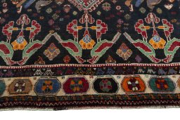 Close-up detail of 2000s Shiraz rug from Iran / Persia showing Wool weave