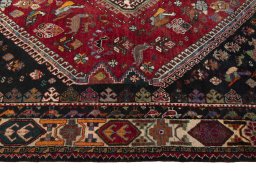 Full view of 2000s Shiraz rug from Iran / Persia, 278 × 177 cm in Red tones