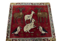 Surface texture of 2000s Shiraz rug with natural Wool and intricate pattern
