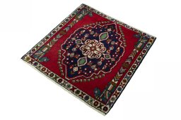Corner detail of 2000s Shiraz rug showing border pattern and Wool pile