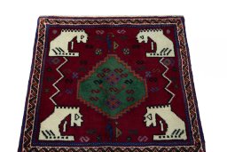 Surface texture of 2000s Shiraz rug with natural Wool and intricate pattern
