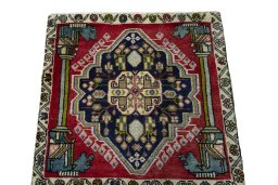 Surface texture of 2000s Shiraz rug with natural Wool and intricate pattern