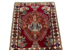 Surface texture of 2000s Shiraz rug with natural Wool and intricate pattern