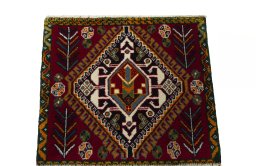Surface texture of 2000s Shiraz rug with natural Wool and intricate pattern