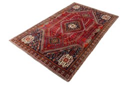 Corner detail of 2000s Shiraz rug showing border pattern and Wool pile