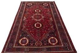 Corner detail of 1970s Shiraz rug showing border pattern and Wool pile