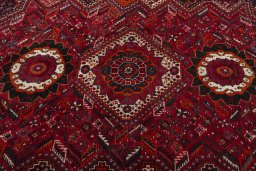 Surface texture of 1970s Shiraz rug with natural Wool and intricate pattern