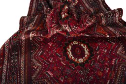 Full view of 1970s Shiraz rug from Iran / Persia, 290 × 184 cm in Red tones
