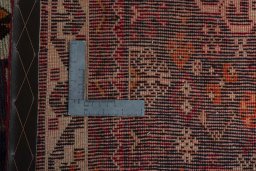 Backside of handmade 2000s Shiraz rug showing knot structure and weave density