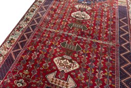 Backside of handmade 2000s Shiraz rug showing knot structure and weave density