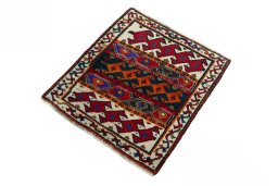 Corner detail of 2000s Shiraz rug showing border pattern and Wool pile