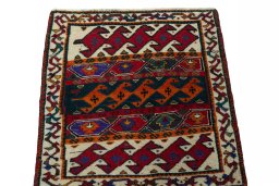 Surface texture of 2000s Shiraz rug with natural Wool and intricate pattern
