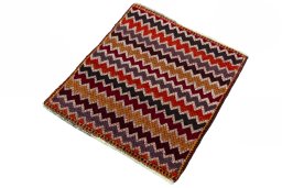 Corner detail of 2000s Shiraz rug showing border pattern and Wool pile