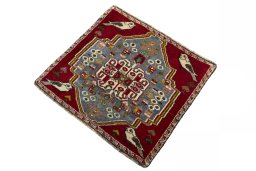 Corner detail of 2000s Shiraz rug showing border pattern and Wool pile