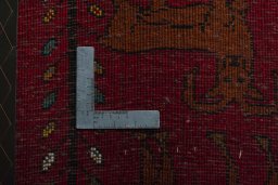 Backside of handmade 2000s Shiraz rug showing knot structure and weave density