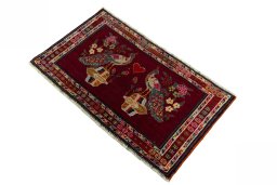 Corner detail of 2000s Shiraz rug showing border pattern and Wool pile