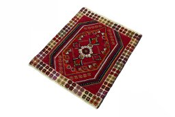 Corner detail of 2000s Shiraz rug showing border pattern and Wool pile