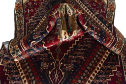 Close-up detail of 2000s Shiraz rug from Iran / Persia showing Wool weave