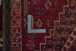 Surface texture of 2000s Shiraz rug with natural Wool and intricate pattern