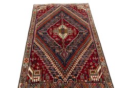 Surface texture of 2000s Shiraz rug with natural Wool and intricate pattern